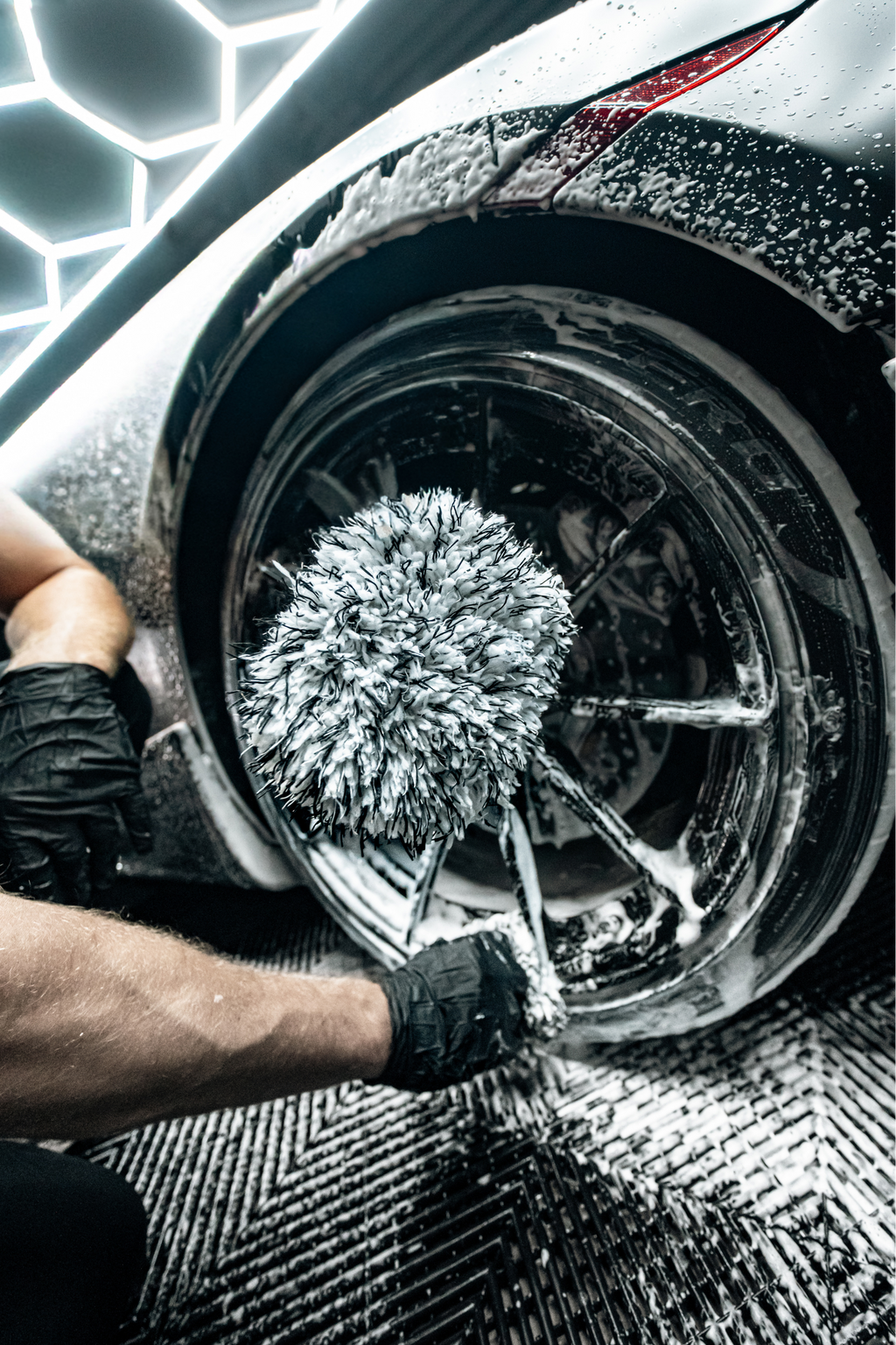 BLACKLINE MICROFIBER WHEEL MITT — in-use lifestyle photo