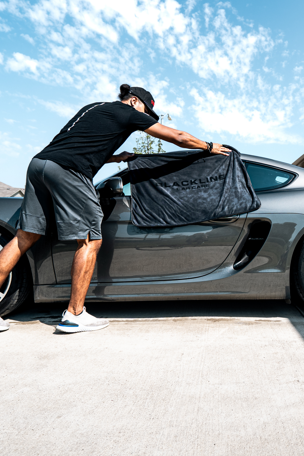 BLACKLINE SLIM TWISTED-LOOP DRYING TOWEL — in-use lifestyle photo